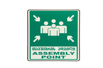 Safety Sign Indicating Assembly Point for Evacuation in Emergency Situations Featuring Figures and Arrow Symbols in Bold Green and White Design