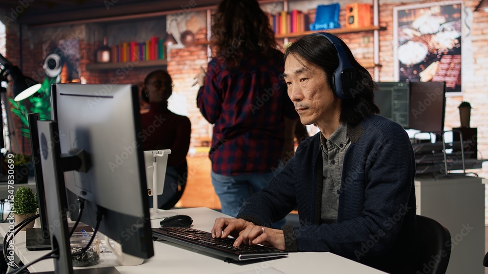Poster ai startup office chief technology officer listening music while coding application. senior programm