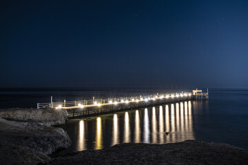 lights on the pier at night