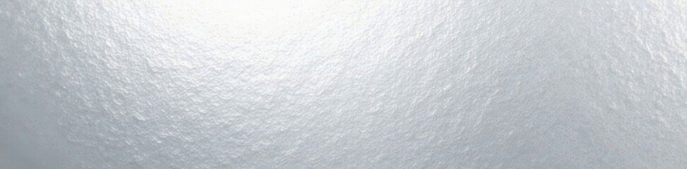 Fototapeta premium Shiny silver metallic surface with subtle texture pattern, metallic sheen, reflective material, modern design