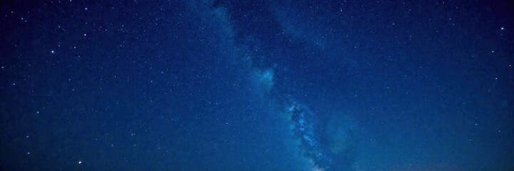 Obraz premium starry night sky with countless stars in deep blue darkness, celestial bodies, heavenly