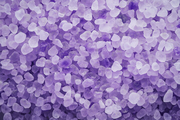 Lavender bath salt crystals forming a relaxing background texture