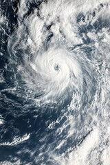 Satellite image of hurricane storm cloud viewed from space.