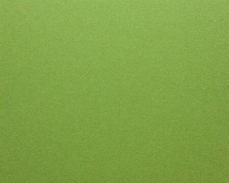 Uniform green textured surface displaying a subtle granular appearance