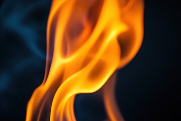 A close up image of a vibrant orange flame burning brightly