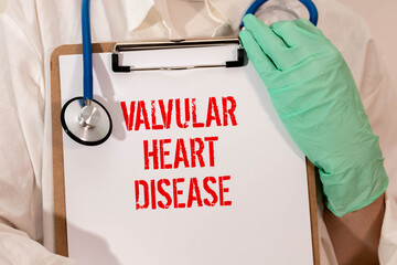 Doctor holding human Heart model. Cardiovascular Diseases, Atherosclerosis