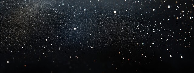 Subtle glitter gradient adorns a black background with minimal festive sparkles.