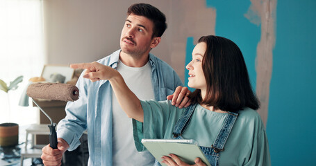 House, painting and couple with tablet, planning and ideas on social media for new home. Discussion, online search and people with tech for creative, renovation and painter with roller in apartment