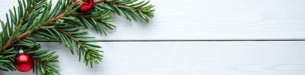 Obraz premium Fir branches on wooden white board with snowfall in festive background, peaceful , festive, New Year