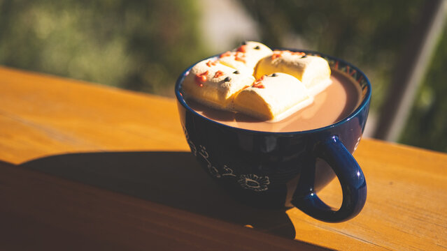 Hot chocolate with easter themed chick yellow marshmallows holiday happy