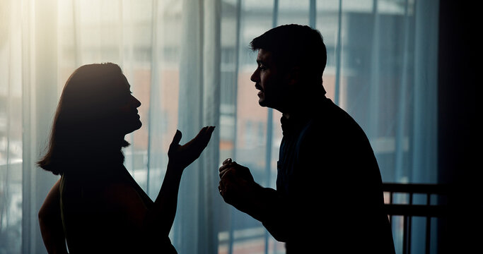 Conflict, couple and disagreement with argument in home for cheating affair, marriage infidelity or betrayal. Silhouette, frustrated people and pregnant woman for toxic relationship, drama or divorce