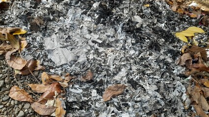 Ash burning of dry leaves and paper