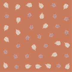 a pattern of leaves on a brown background