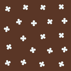 a brown and white flower pattern with white flowers