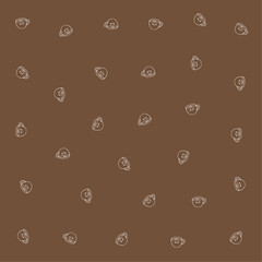 a brown background with a pattern of faces