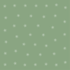 a green background with a pattern of white flowers