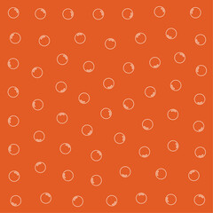 a pattern of circles on an orange background