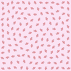 a pattern of red berries on a pink background