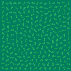 a green background with a pattern of leaves