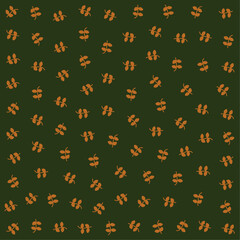 a pattern of small leaves on a green background