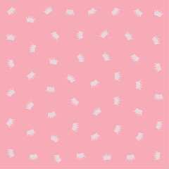 a pink background with a pattern of white crowns