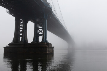 Manhattan Bridge view covered in heavy fog