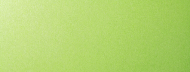 質感のある若草色の紙の、背景テクスチャー