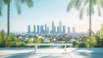 Fototapeta premium serene view of Los Angeles cityscape with palm trees and bench in foreground, under clear blue sky. skyline is slightly blurred, creating peaceful atmosphere