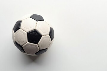 Fototapeta premium Overhead view of perfectly positioned football on pure white backdrop, oval, game, isolated