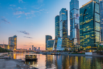 Obraz premium High buildings of Moscow-City at Moskva River at summer sunset, Russia.
