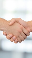 Close-up of Two Hands Shaking in a Professional Agreement Context