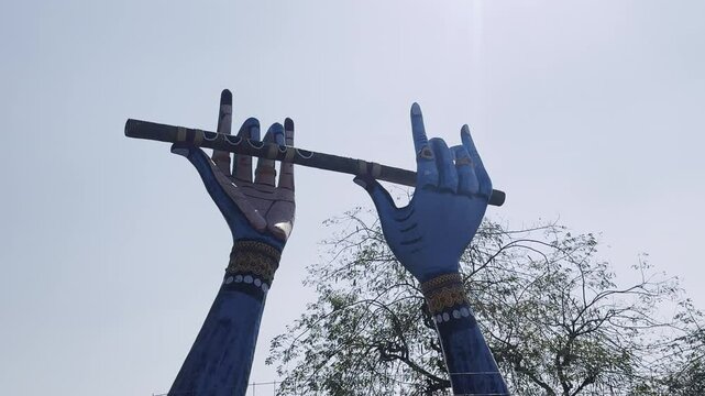 Lord Krishna hands take flute