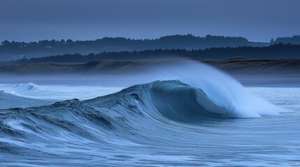 Powerful wave cresting at dusk, forested coastline in soft, muted lighting