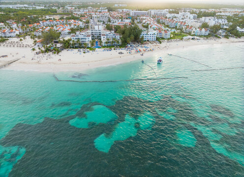 A beautiful blue ocean with a white sandy beach
