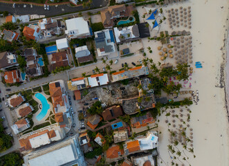 A beach town with a lot of houses and a pool