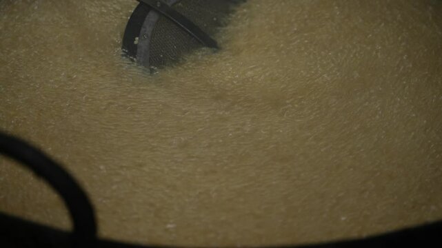 Making of Bengali spicy food chanachur.