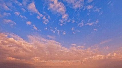 Fototapeta premium cute sunrise gold clouds on the sky background - photo of nature