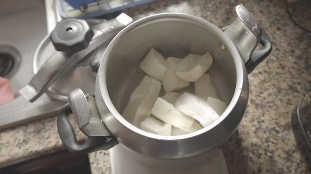 pressure stove with raw cassava for cooking, c-log 8bit hd video, canon eos R