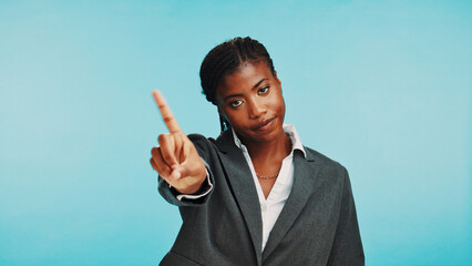 No, upset and portrait of businesswoman in studio with warning, rejection or negative opinion. Advice, wrong and African person with disagreement for unhappy, stop or serious on blue background.