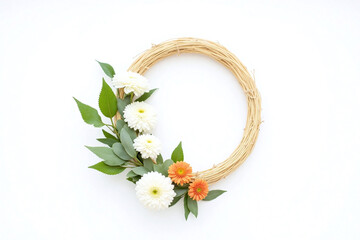 gold frame with white flowers and greenery on it