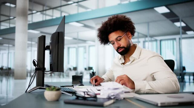 The African American Accountant Happily Preparing Tax Invoices