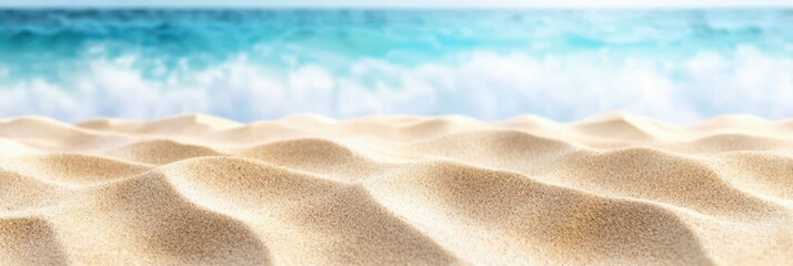 Obraz premium Soft golden sand stretches along the beach, with gentle waves rolling in from the ocean. The sunlight sparkles on the water, creating a tranquil atmosphere