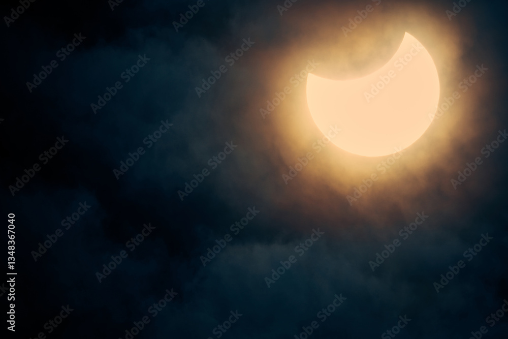 Wall mural solar eclipse view through a telescope and a special solar filter.