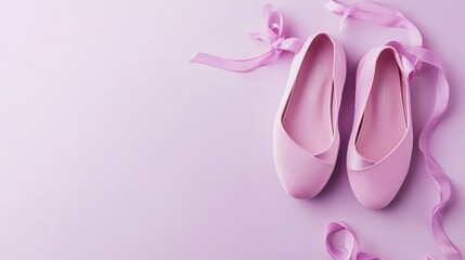 Pretty pink ballet flats with ribbons.