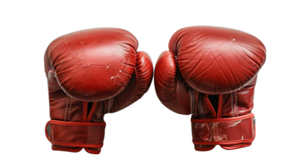Pair of worn red boxing gloves facing each other on transparent background