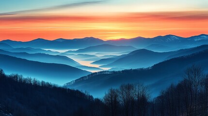 Obraz premium Mountain Range Landscape with Fog at Sunset Scenery and Colorful Sky