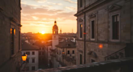 Obraz premium Golden Hour Sunset over Italian Hilltop Town, Bell Tower Silhouette