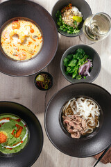 Pho bo and tom yum soup in a restaurant