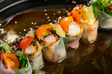 spring rolls with shrimp, sesame and soy sauce