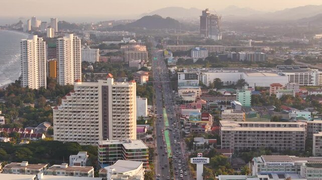 Hua Hin aerial flight above cars move along Phet Kasem Road 